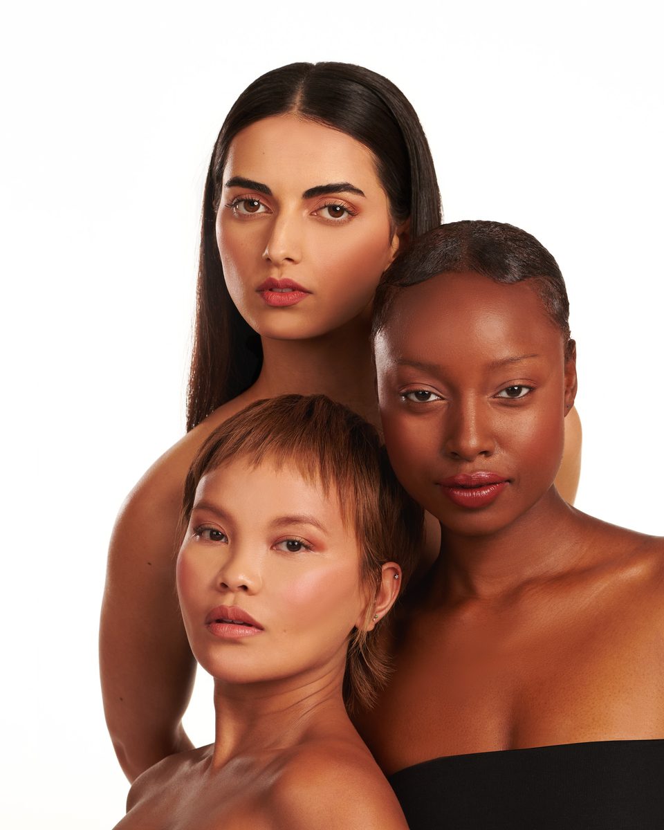 Three models with different skin tones